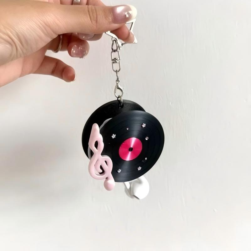 Y2K Vintage Record Shaped Earp - огляд і ціна Cable Winder Keychain