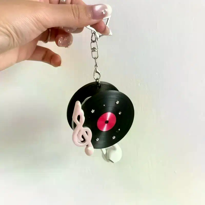 Y2K Vintage Record Shaped Earp - огляд і ціна Cable Winder Keychain